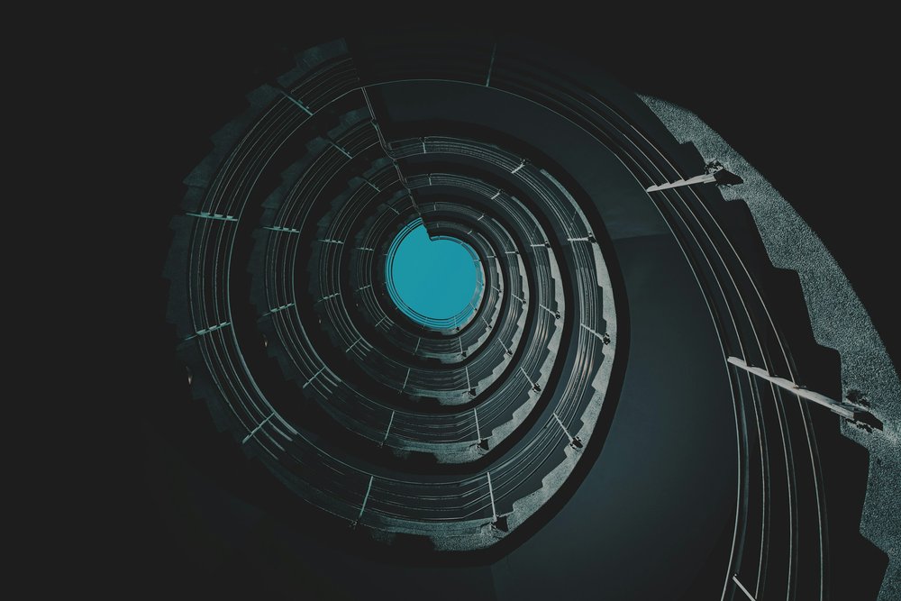 spiral staircase representing a trauma loop