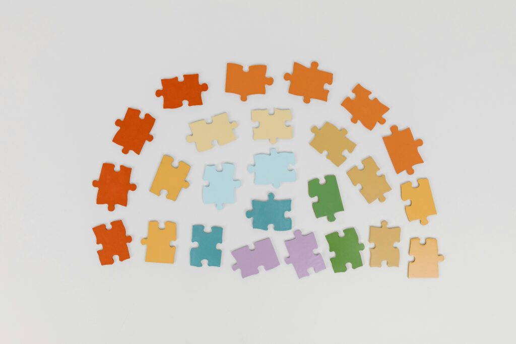 image of jigsaw pieces arranged in rainbow shape representing stop pattern behavior 