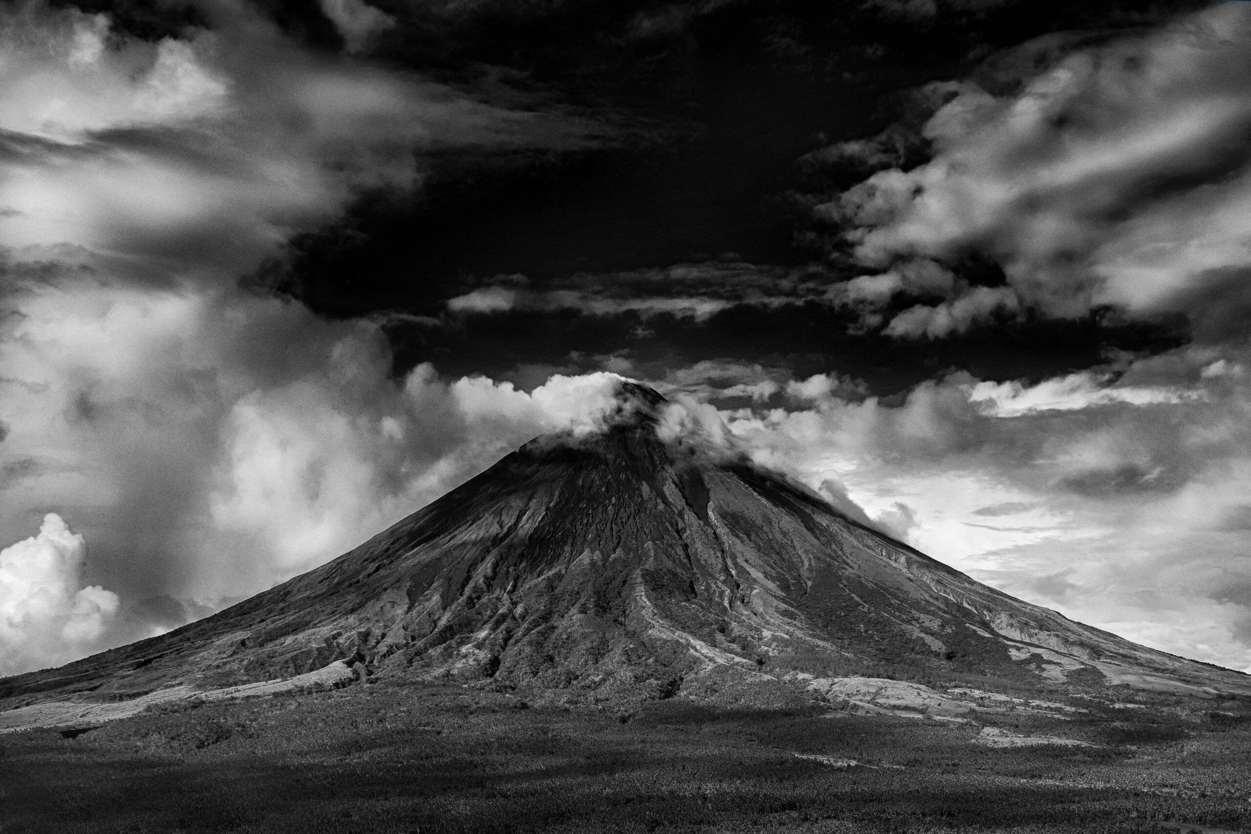 volcano erupting in black and white representing soul disconnection