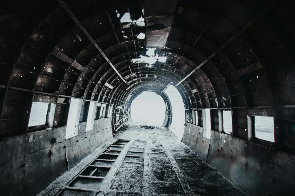 black and white image of abandoned aircraft representing anxiety and unsafe living environment