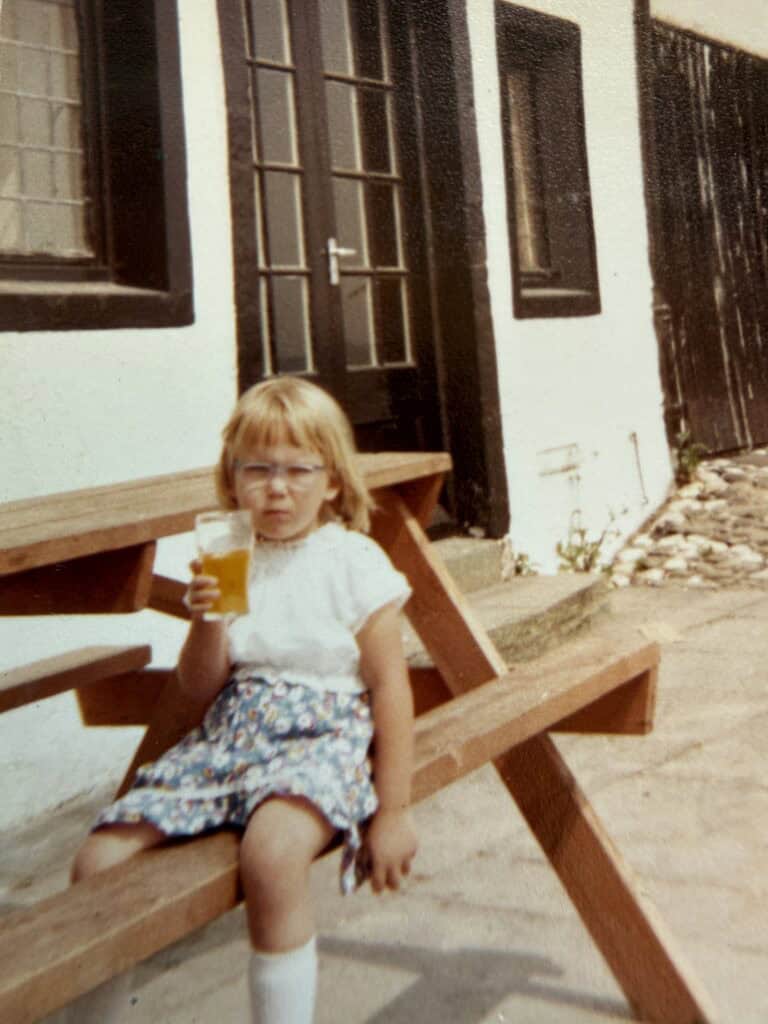 The easy kid - childhood photo of Sarah, already learning to hold it together